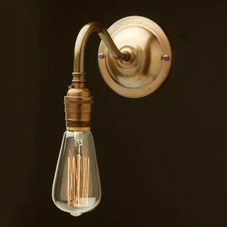 Antiqued brass coventry bend wall sconce