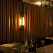 Grossi cafe Ombra using cage wall lamps