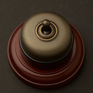 Traditional Antique Brass and porcelain single switch on optional timber block