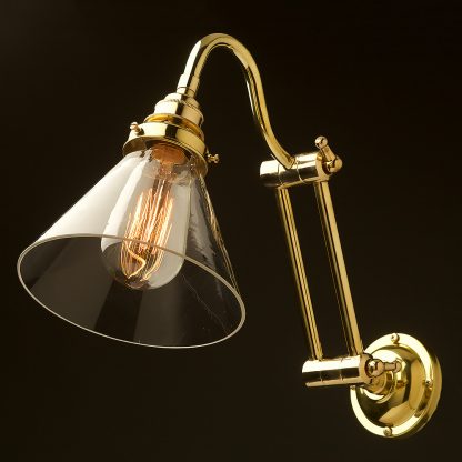 Two bend adjustable solid brass arm wall light clear glass cone