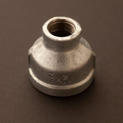 42mm (1 1/4 inch) to 22mm (half inch) plumbing pipe coupler galvanised